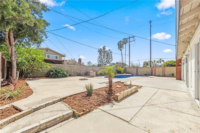 10022 Bismark Dr, Huntington Beach, CA 92646 - view of patio with a fenced backyard and a fenced in pool