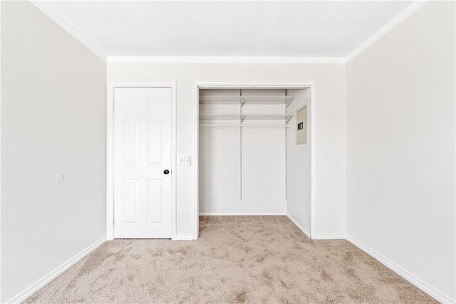 10022 Bismark Dr, Huntington Beach, CA 92646 - unfurnished bedroom with ornamental molding, carpet, a closet, and baseboards