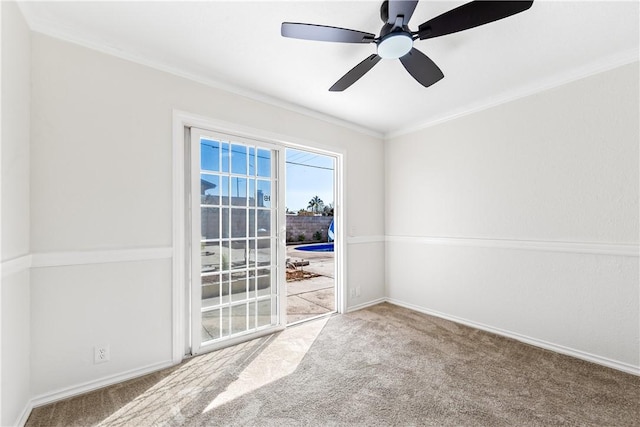 10022 Bismark Dr, Huntington Beach, CA 92646 - carpeted spare room with baseboards, ornamental molding, and a ceiling fan