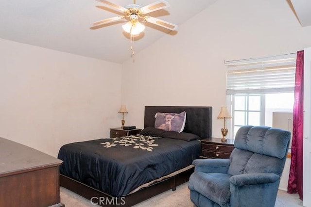 bedroom featuring light colored carpet, high vaulted ceiling, and a ceiling fan