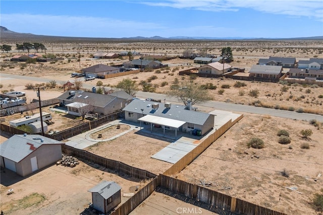 bird's eye view featuring a mountain view and a desert view