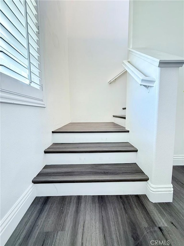 16977 Red Tail Ln, Fontana, CA 92336 - staircase with baseboards and wood finished floors