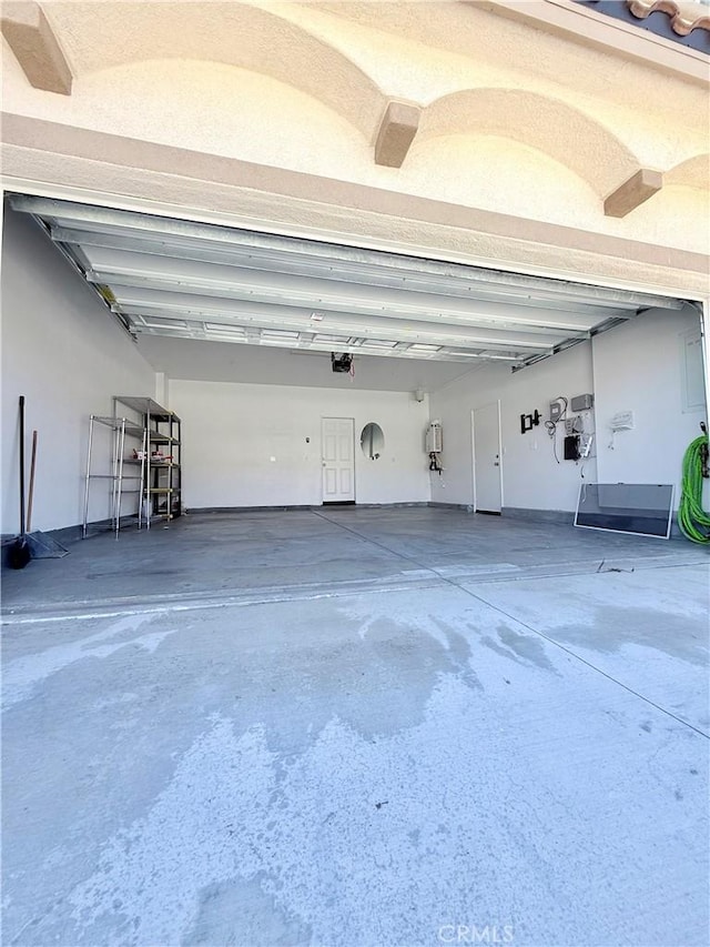 16977 Red Tail Ln, Fontana, CA 92336 - garage featuring a garage door opener