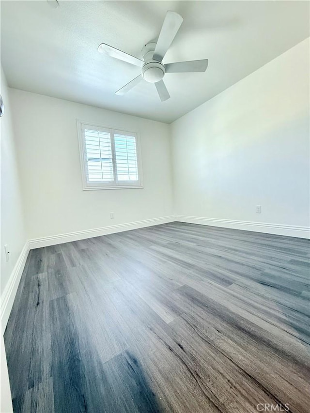16977 Red Tail Ln, Fontana, CA 92336 - spare room featuring baseboards, wood finished floors, and a ceiling fan