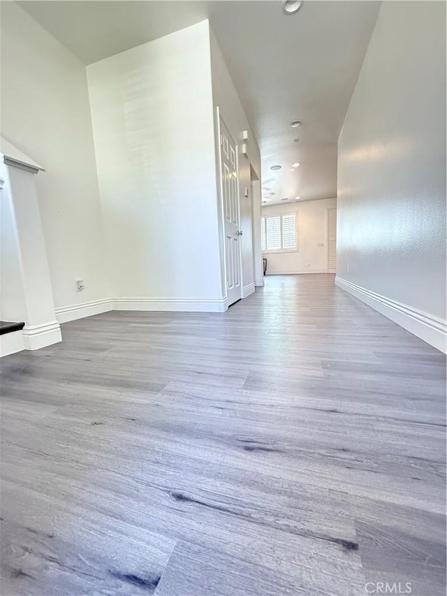 16977 Red Tail Ln, Fontana, CA 92336 - empty room featuring recessed lighting, baseboards, and wood finished floors