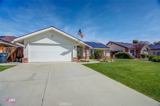 ranch-style home with a garage, fence, concrete driveway, and a front yard