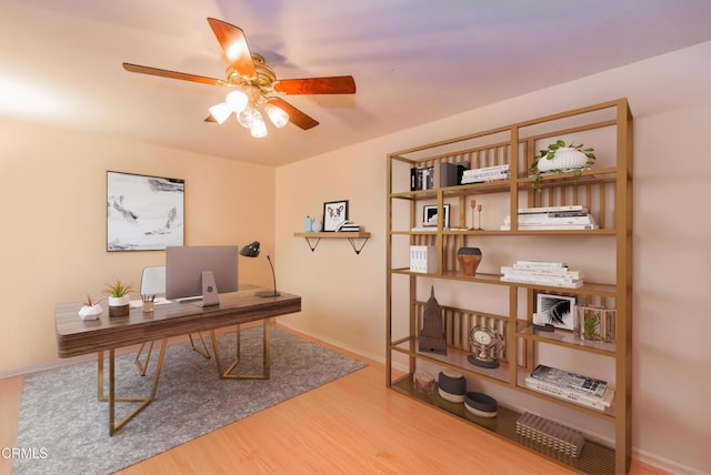 4558 Jessica Dr, Los Angeles, CA 90065 - office area featuring baseboards, a ceiling fan, and wood finished floors