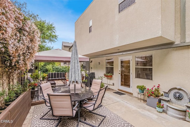 4558 Jessica Dr, Los Angeles, CA 90065 - view of patio with a gazebo, fence, and outdoor dining space