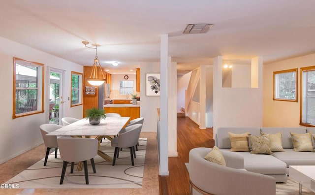 4558 Jessica Dr, Los Angeles, CA 90065 - dining room featuring visible vents and baseboards