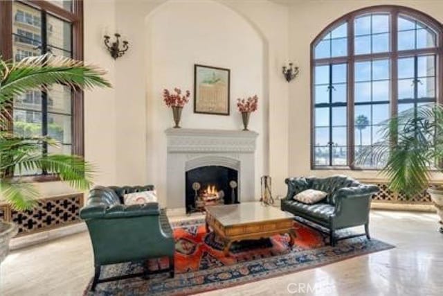 800 E Ocean Blvd Unit 1404, Long Beach, CA 90802 - sitting room featuring a warm lit fireplace