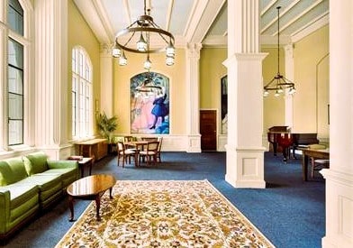800 E Ocean Blvd Unit 1404, Long Beach, CA 90802 - lobby featuring a towering ceiling, a decorative wall, wainscoting, and ornamental molding