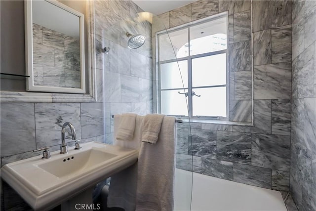 800 E Ocean Blvd Unit 1404, Long Beach, CA 90802 - bathroom featuring tile walls, healthy amount of natural light, and shower / bath combination