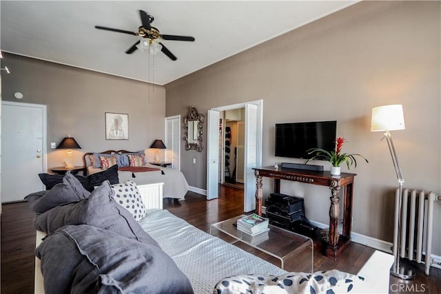 800 E Ocean Blvd Unit 1404, Long Beach, CA 90802 - living area with radiator heating unit, ceiling fan, wood finished floors, and a towering ceiling