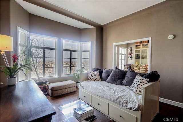 800 E Ocean Blvd Unit 1404, Long Beach, CA 90802 - living room with dark wood-style flooring and baseboards