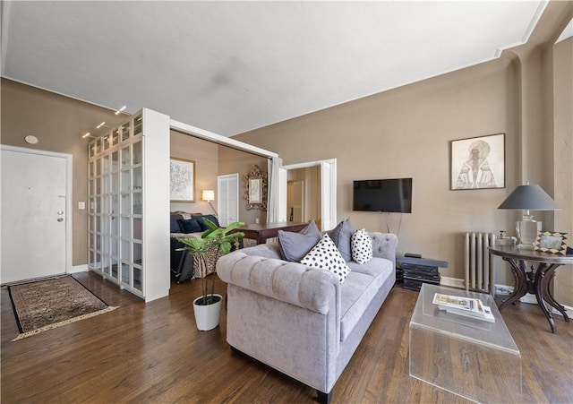 800 E Ocean Blvd Unit 1404, Long Beach, CA 90802 - living room featuring radiator and wood finished floors