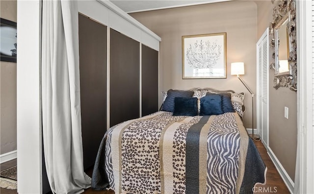 800 E Ocean Blvd Unit 1404, Long Beach, CA 90802 - bedroom featuring wood finished floors and a closet