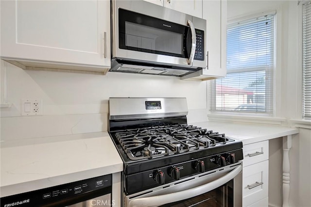 kitchen with white cabinets and stainless steel appliances
