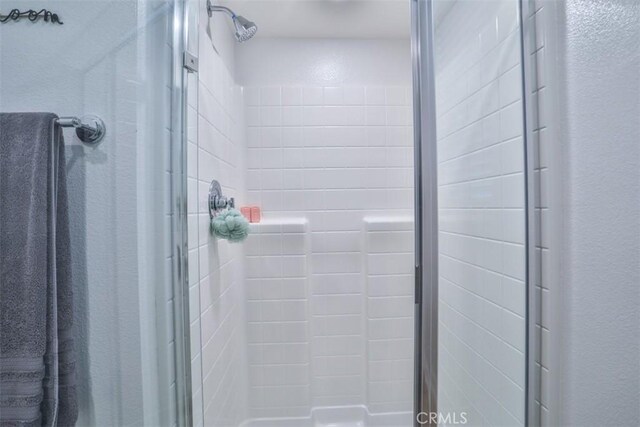 24307 Juni Ct, Corona, CA 92883 - full bathroom featuring a shower stall