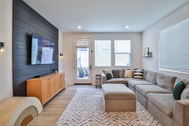 living room featuring recessed lighting and light wood-style flooring