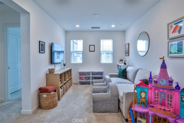 living room with carpet, visible vents, recessed lighting, and baseboards