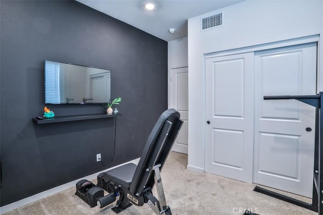 carpeted office featuring baseboards and visible vents