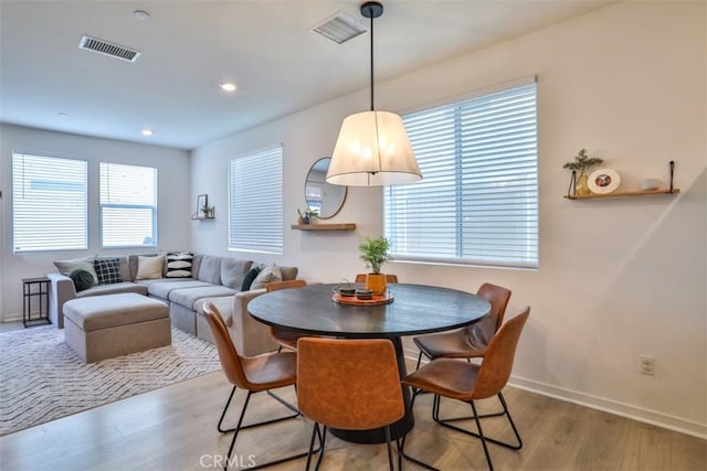 24307 Juni Ct, Corona, CA 92883 - dining space with light wood-style flooring, baseboards, and recessed lighting