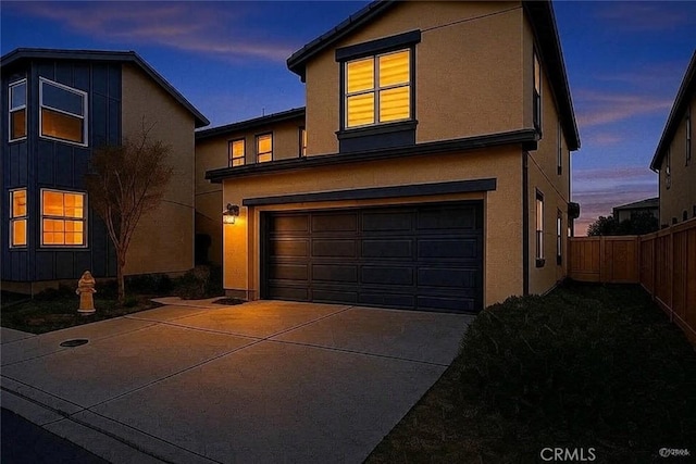 24307 Juni Ct, Corona, CA 92883 - traditional-style house with a garage, stucco siding, and concrete driveway