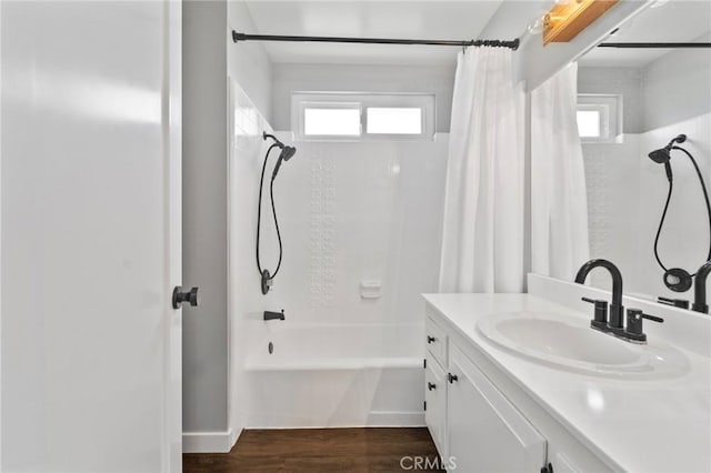 full bathroom featuring shower / bath combination with curtain, plenty of natural light, and vanity