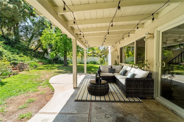 view of patio with fence and an outdoor hangout area