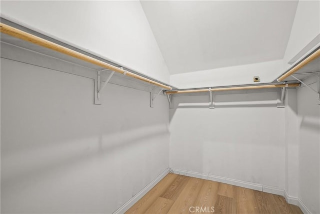 23817 Crest Forest Dr, Crestline, CA 92325 - walk in closet featuring light wood-style flooring