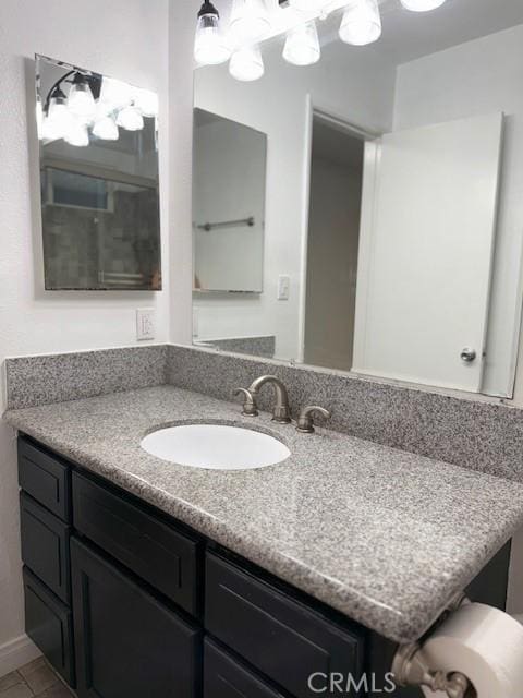 13305 Cordary Ave, Hawthorne, CA 90250 - bathroom featuring vanity and tile patterned flooring