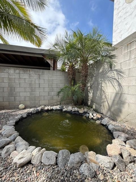 13305 Cordary Ave, Hawthorne, CA 90250 - view of yard with a garden pond