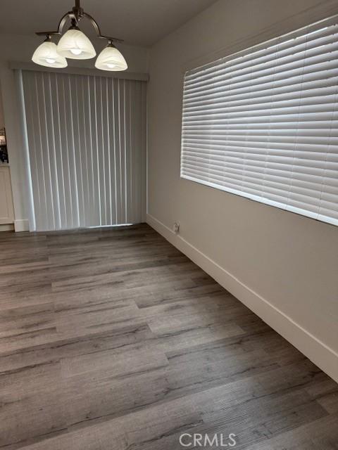13305 Cordary Ave, Hawthorne, CA 90250 - unfurnished dining area featuring wood finished floors