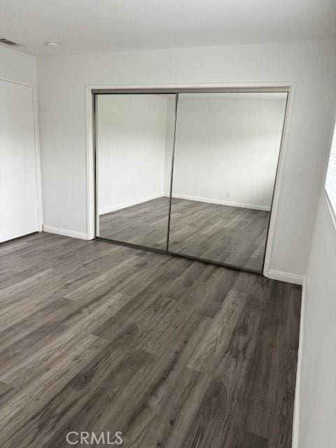13305 Cordary Ave, Hawthorne, CA 90250 - unfurnished bedroom with wood finished floors and a closet