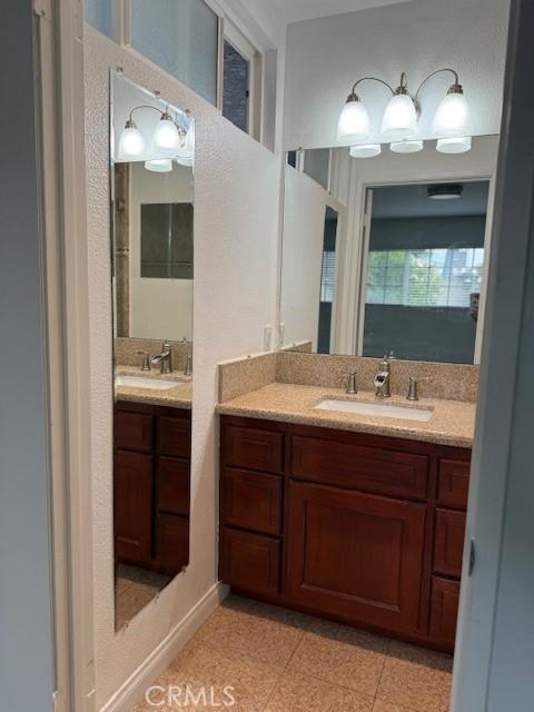 13305 Cordary Ave, Hawthorne, CA 90250 - bathroom featuring vanity and tile patterned flooring