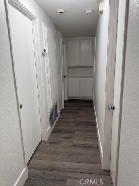 13305 Cordary Ave, Hawthorne, CA 90250 - hall with dark wood-type flooring and baseboards