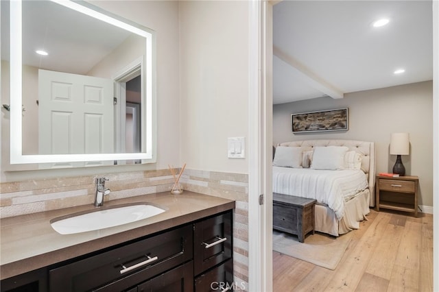 247 Calliope St, Laguna Beach, CA 92651 - bathroom featuring vanity, wood finished floors, recessed lighting, and beamed ceiling