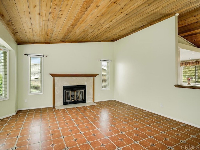 950 E Elder St, Fallbrook, CA 92028 - unfurnished living room featuring plenty of natural light, wooden ceiling, a premium fireplace, baseboards, and lofted ceiling