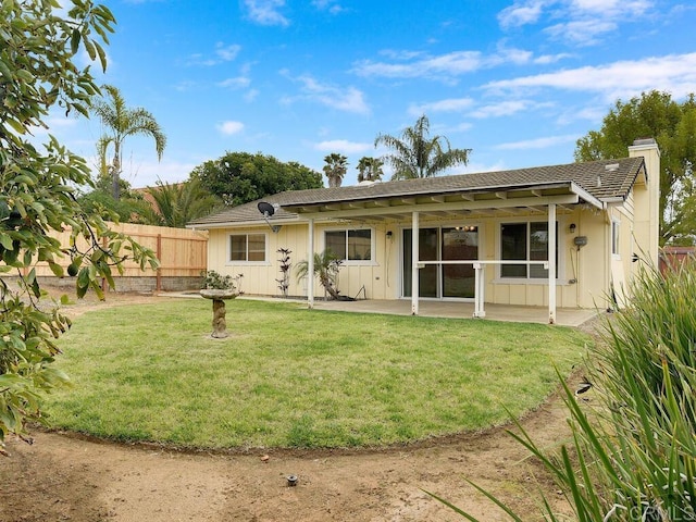 950 E Elder St, Fallbrook, CA 92028 - back of house with board and batten siding, a chimney, and a patio