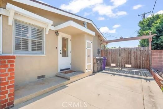 view of patio with fence