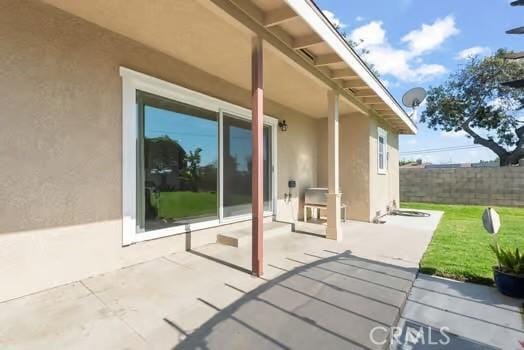 view of patio with fence