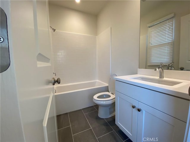 full bath featuring toilet, vanity, tile patterned flooring, and bathtub / shower combination