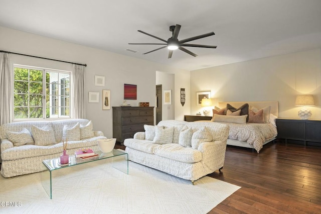bedroom featuring dark wood finished floors and a ceiling fan