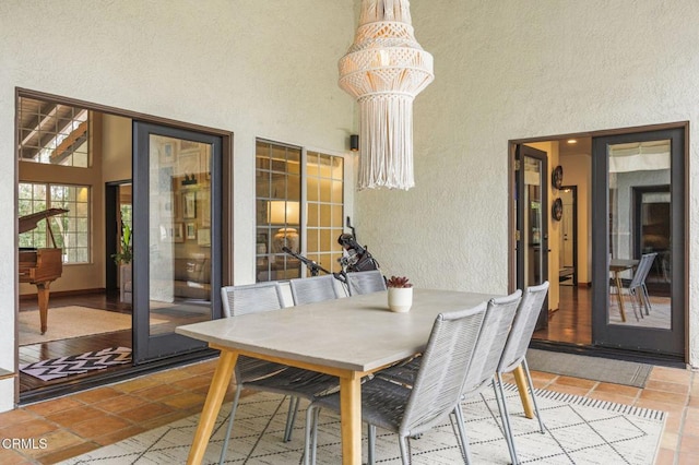 dining room with a textured wall