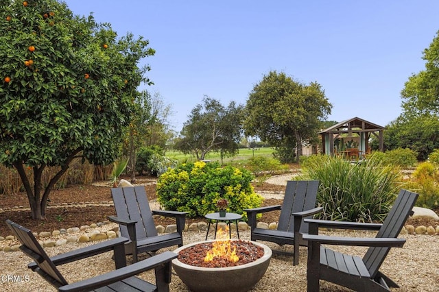 view of patio featuring a fire pit