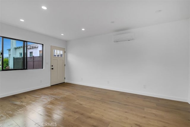 433 N Buena Vista St, Burbank, CA 91505 - foyer with a wall mounted AC, plenty of natural light, wood finished floors, and recessed lighting