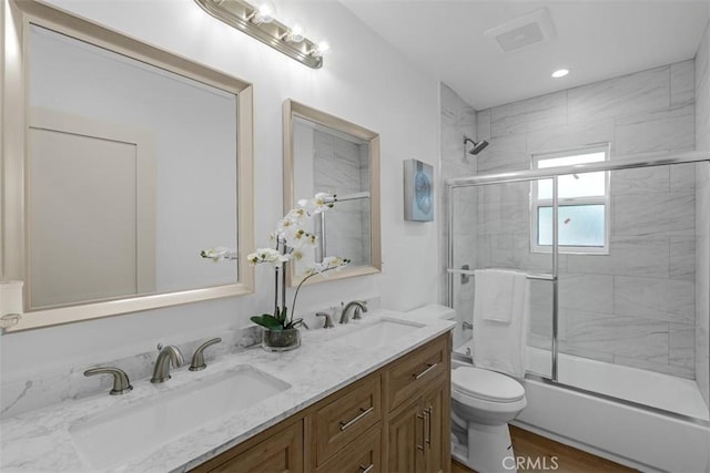433 N Buena Vista St, Burbank, CA 91505 - bathroom with double vanity, toilet, and enclosed tub / shower combo