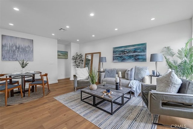433 N Buena Vista St, Burbank, CA 91505 - living area with wood finished floors, recessed lighting, and baseboards