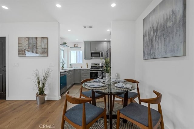 433 N Buena Vista St, Burbank, CA 91505 - dining area featuring light wood finished floors, recessed lighting, and baseboards