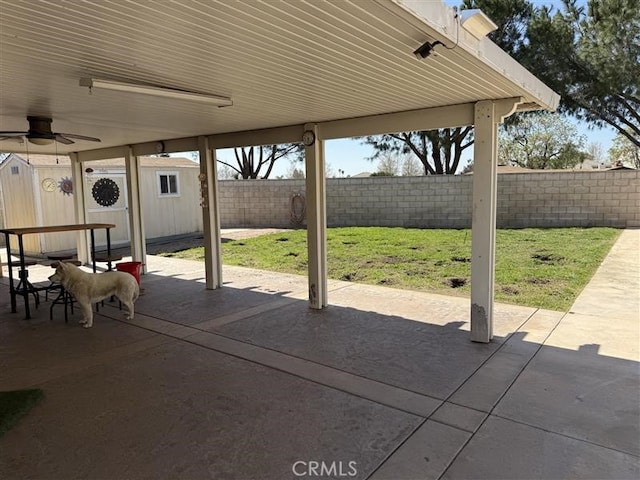view of patio / terrace featuring a fenced backyard and ceiling fan